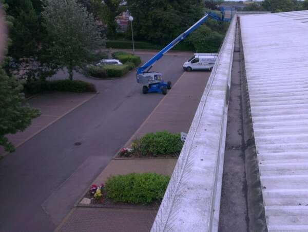 Commercial gutter clearing — photograph from JettaClean